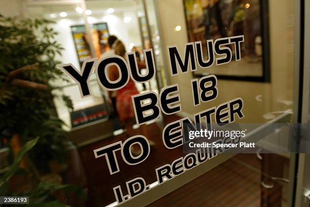 Sign warns off the underage at the Penthouse Boutique August 10, 2003 in Milford, Connecticut. The Penthouse Boutique, which is not owned by the...