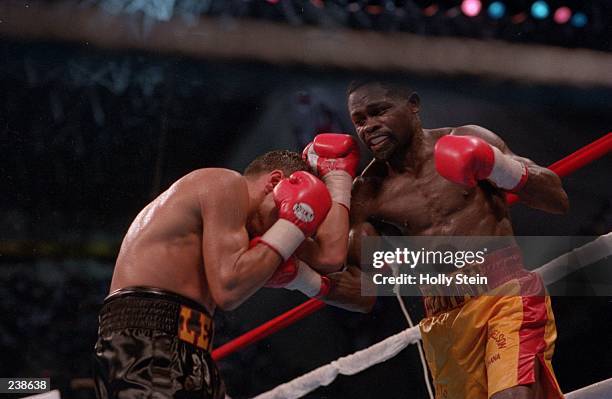 Boxer Azumah Nelson Throws a punch at Jesse James Leija during the match in San Antonio, Texas. Mandatory Credit: Holly Stein/ALLSPORT