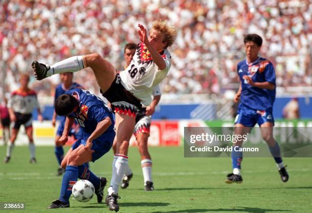 JUERGEN KLINSMANN OF GERMANY IS UNDERCUT BY JEONG WOON KO OF SOUTHY KOREA DURING GERMANY'S 3-2 VICTORY OVER SOUTH KOREA IN A 1994 WORLD CUP GAME AT...