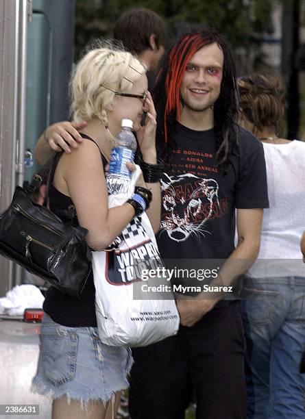 Bert McCraken, lead singer of The Used and Kelly Osbourne's ex-boyfriend, chats with a fan backstage at the 2003 Vans Warped Tour on Randall's Island...
