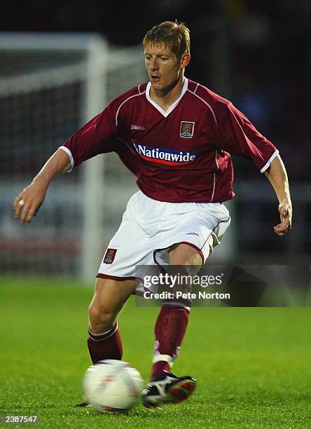 Peter Clark of Northampton Town runs with the ball during the Pre-Season Friendly match between Northampton Town and Watford held on July 30, 2003 at...