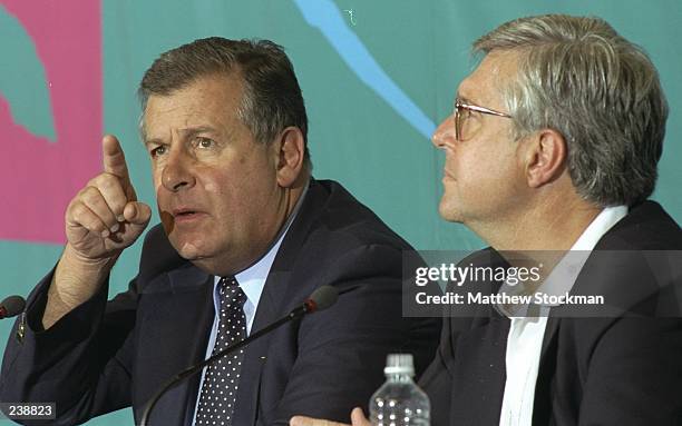 Francois Carrard, the IOC Director general , and A.D. Frazier, the CEO of ACOG, speak at a press conference regarding developments on the explosion,...