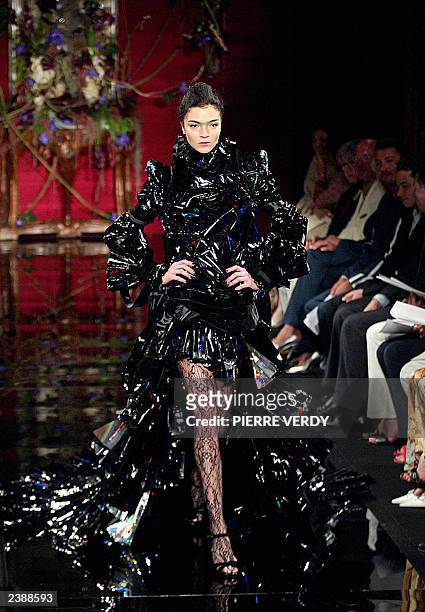 Model presents a creation by Julien Macdonald for Givenchy 08 July 2003 during the autumn-winter 2003/04 haute couture collections in Paris. AFP...
