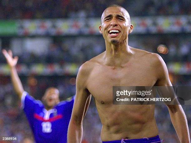 French forward David Trezeguet jubilates after scoring the golden goal in extra time during the Euro-2000 soccer final match between France and Italy...