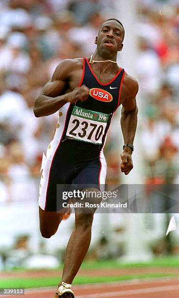 Michael Johnson of the USA in action during qualifying for the men''s 200 meters sprint at Olympic Stadium in Atlanta, Georgia. Johnson placed first...