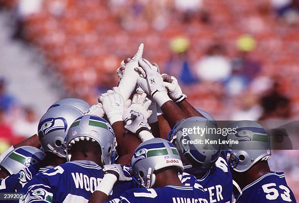 The Seattle Seahawks huddle together prior to their 17-14 loss to the San Diego Chargers at Jack Murphy Stadium in San Diego, California. Mandatory...