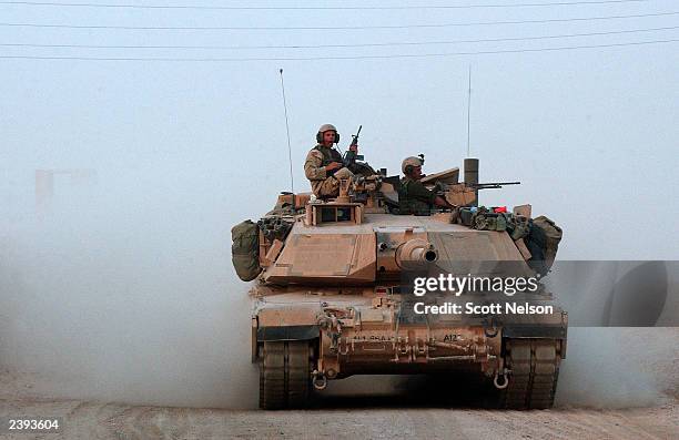 Army 4th Infantry Division, 1st Battalion, 66th Regiment Abrahms tank heads out for an evening patrol from its base August 12, 2003 in Samarra, Iraq....