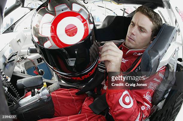 Casey Mears, driver of the Ganassi Racing Target Dodge Intrepid, puts on his helmet during practice for the Sirius at The Glen Winston Cup Race on...