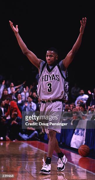 Allen Iverson of Georgetown celebrates as he walks off the court after the Georgetown Hoyas defeat the Connecticut Huskies 77-65 at the U.S. Air...