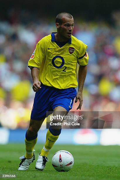 Freddie Ljungberg of Arsenal runs with the ball during the FA Community Shield match between Arsenal and Manchester United held on August 10, 2003 at...