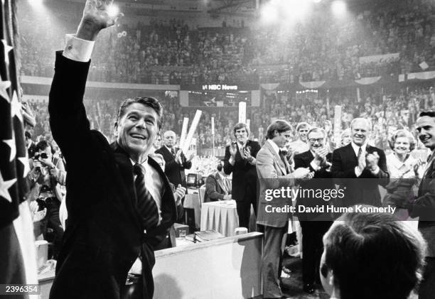 Ronald Reagan waves to the crowd on the final night of the Republican National Convention August 19, 1976 in Kansas City, Missouri. Behind Reagan...