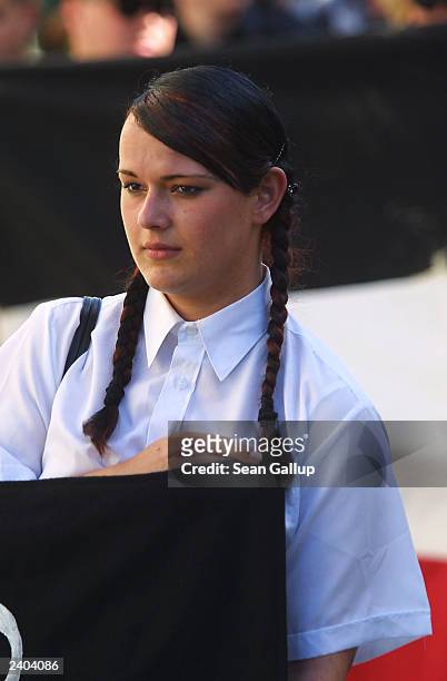 Female neo-Nazi marches August 16, 2003 through Wunsiedel, Germany to commemorate the anniversary of the death of Rudolf Hess. Approximately 2,600...