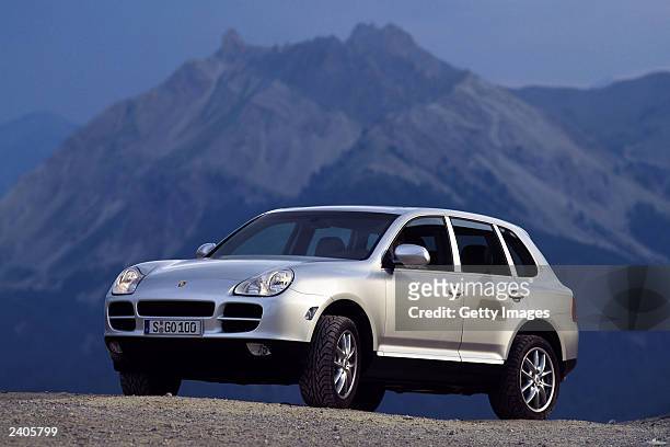 In this undated handout photo provided by Porsche AG, a Porsche Cayenne car is shown. Porsche announced August 15, 2003 a sales increase in July,...
