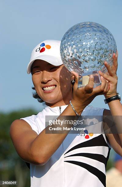 Se Ri Pak, of Korea, holds her trophy after winning the Jamie Farr Kroger Classic August 17, 2003 in Sylvania, Ohio. Pak won the tournament for the...