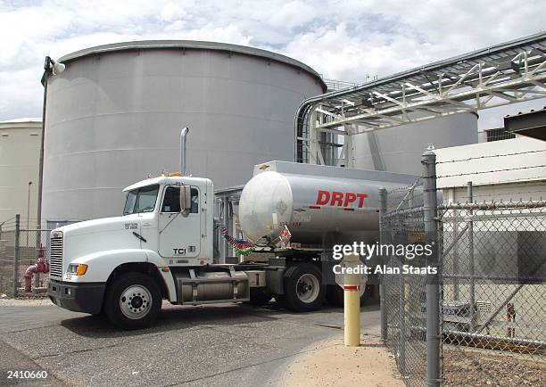 An independent tanker truck leaves the Chevron fuel farm at the Kinder-Morgan storage facility August 19, 2003 in southwest Phoenix, Arizona. After a...