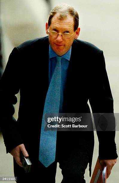 Downing Street spokesman Tom Kelly arrives at the high court to give evidence at the Hutton inquiry on August 20, 2003 in London, England. The...