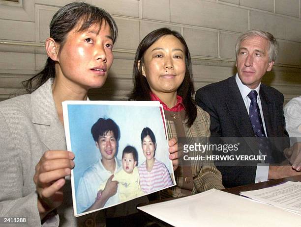 Australian citizen Dai ZHizhen, whose husband disappeared in China, Yuhong Shi, a Chinese student living in Belgium and whose Chinese passport was...