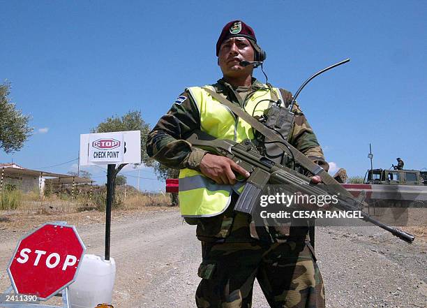 Member of the Salvador Republic peacekeeper mission for Iraq, in the Spanish Military base in Sant Climent Sescebes, Girona, 18 August 2003 attends a...
