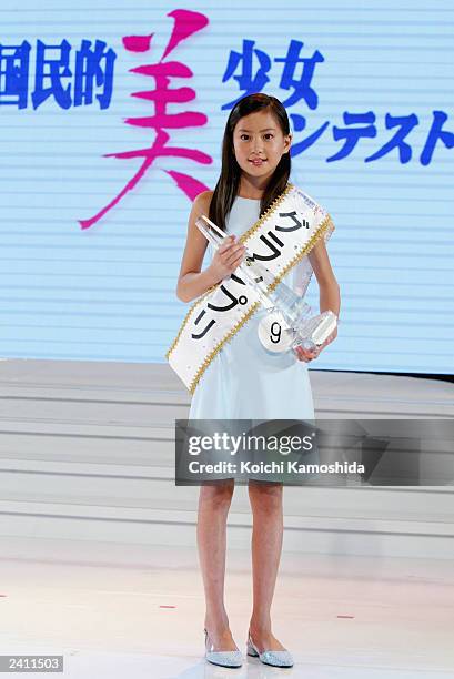 Mayuko Kawakita poses at the Japan Beautiful Teenage Girl contest organized Oscar Promotion, the biggest entertainment agency in Asia August 20, 2003...