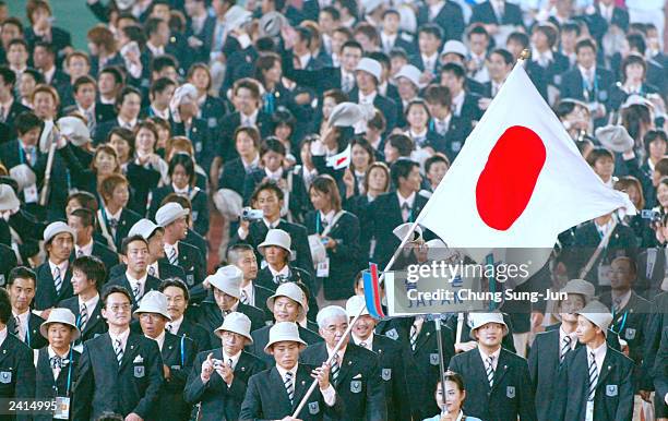 Japanese national team enters the stadium during the opening ceremony of the 22nd Summer Universiade Games August 21, 2003 in Daegu, South Korea....