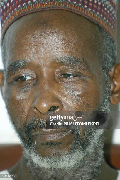 Fifty five-year-old Sarimu Mohammed listens in the courtroom,19 August 2003 as the Jigawa State Sharia Court of Appeal quashed the rape charge...