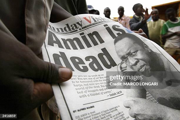 a-street-vendor-shows-the-headline-reporting-the-death-of-former-ugandan-dictator-idi-amin-dada.jpg
