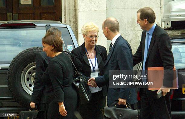 British Prime minister Tony Blair's official spokesmen Tom Kelly and Gordic Smith arrive at the Royal Courts of Justice to testify before the Hutton...