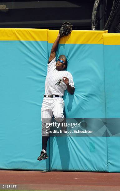 Center fielder Juan Pierre of the Florida Marlins misses a catch during the National League game against the Los Angeles Dodgers at Pro Player...