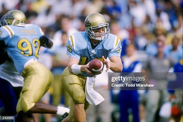 Quarterback Cade McNown of UCLA in action during the Bruins 52-28 win over the University of Washington Huskies at the Rose Bowl in Pasadena,...