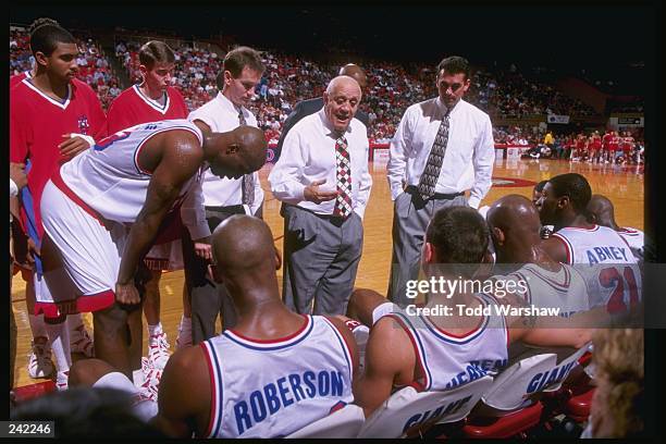 Head coach Jerry Tarkanian of the Fresno State Bulldogs talks to his team during a game against the Florida A&M Rattlers at the Selland Arena in...