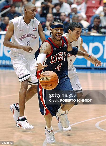 Allen Iverson a member of the US Men's national team sticks his tongue moments after a Dominican player was called with a foul during his team's...