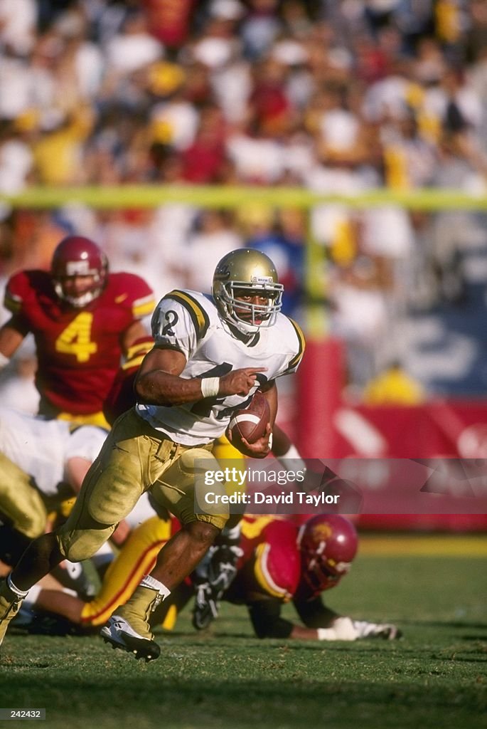 Tailback Skip Hicks of the UCLA Bruins runs with the ball during a