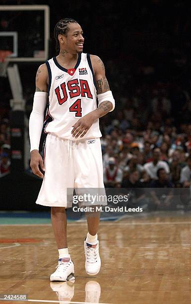 Allen Iverson of the USA smiles over an official's call during an exhibition game against Puerto Rico on August 17, 2003 at Madison Square Garden in...