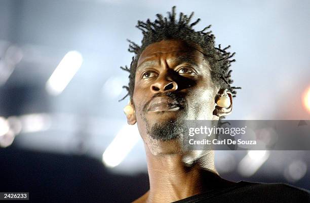 Grant of the British group Massive Attack performs to a crowd of approximately 10,000 at Queens Square August 25, 2003 in Bristol, United Kingdom....