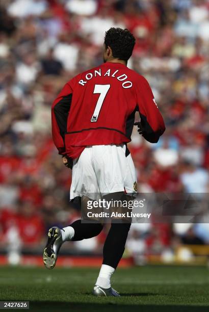 Cristiano Ronaldo of Manchester United makes his debut for his new club during the FA Barclaycard Premiership match between Manchester United and...