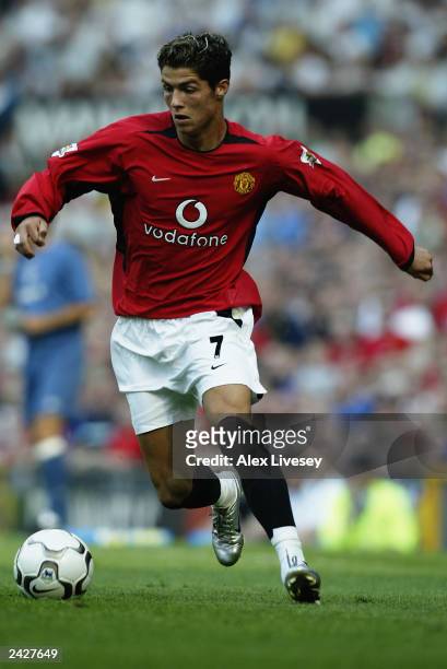 Cristiano Ronaldo of Manchester United makes his debut for his new club during the FA Barclaycard Premiership match between Manchester United and...