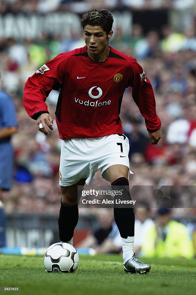 Cristiano Ronaldo of Manchester United runs with the ball during