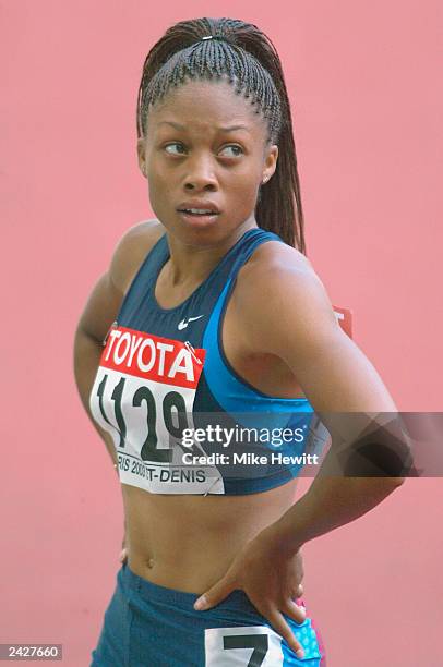 Allyson Felix of USA in action during the heats of the Womens 200m the 9th IAAF World Athletics Championships at the Stade de France on August 26,...