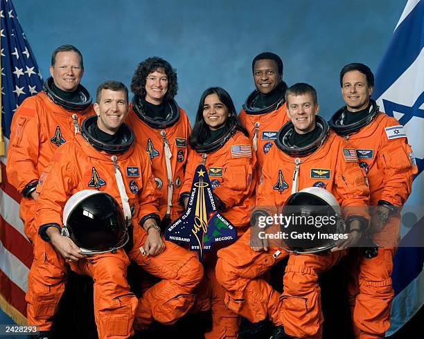 The crew of Space Shuttle Columbia's mission STS-107 pose for the traditional crew portrait. Seated in front are astronauts Rick D. Husband , mission...