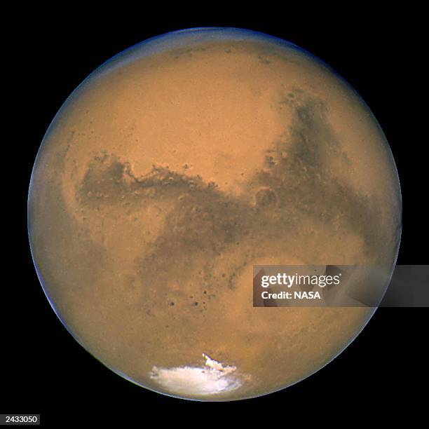 This image released August 27, 2003 captured by NASA's Hubble Space Telescope shows a close-up of the red planet Mars when it was just 34 840 miles...