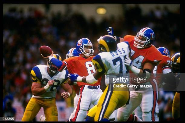 Quarterback Gary Kubiak of the Denver Broncos in action during the American Bowl game against the Los Angeles Rams at Wembley Stadium in London,...