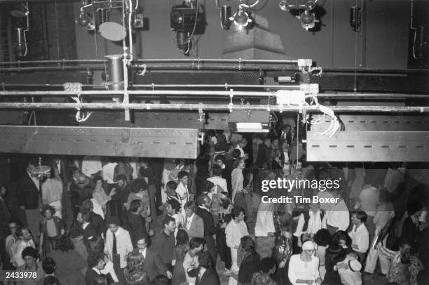 High-angle view of crowds on the dance floor inside the nightclub Studio 54, New York City, April 25, 1977.