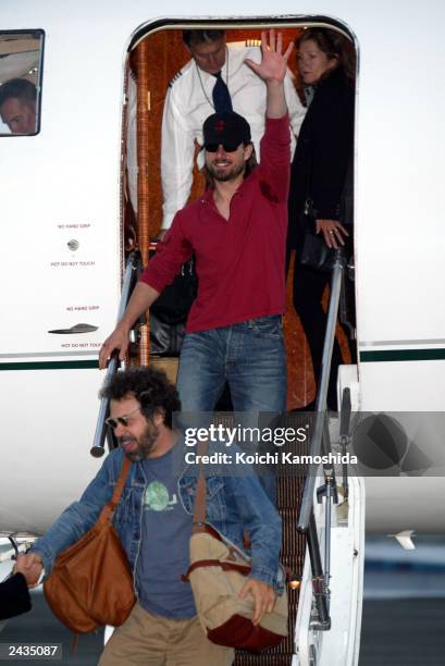 Actor Tom Cruise waves as he arrives at Haneda Airport August 28, 2003 in Tokyo, Japan. Cruise is currently on a promotional tour for his new film...