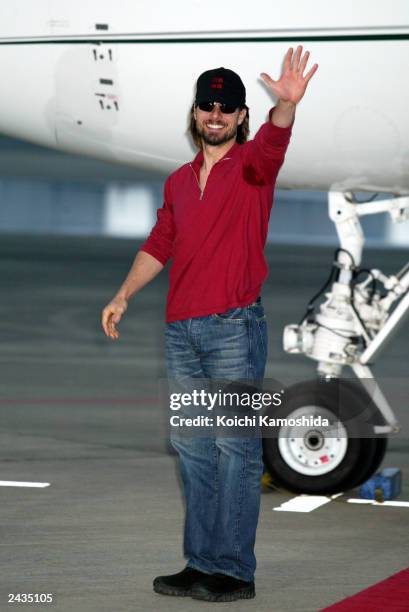 Actor Tom Cruise waves as he arrives at Haneda Airport August 28, 2003 in Tokyo, Japan. Cruise is currently on a promotional tour for his new film...