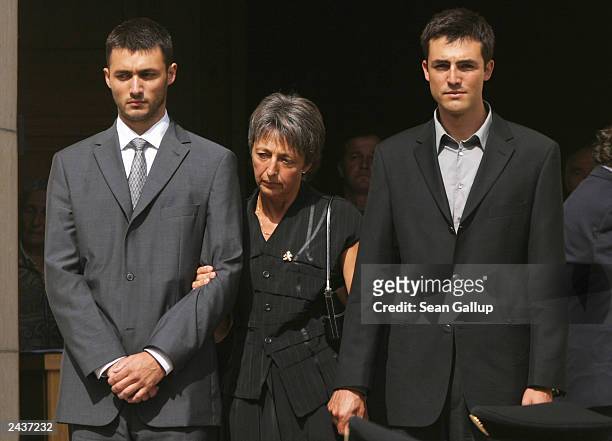 Envoy Sergio Vieira de Mello's widow Annie and sons Laurent and Adrian leave St. Paul's Church after funeral ceremonies for Vieira de Mello on August...