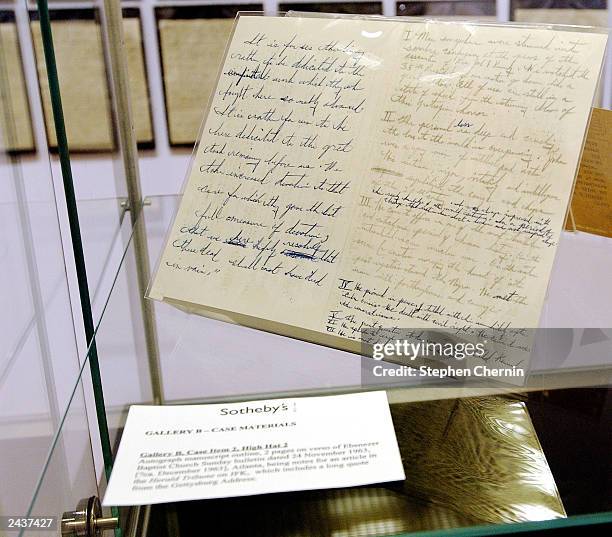 Handwritten notes by Dr. Martin Luther King about the assassination of President John F. Kennedy in 1963 are on display August 28, 2003 at Sotheby's...
