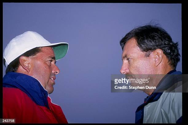 Longtime sailing adversaries, Dennis Conner of the United States chats with John Bertrand of Australia during the opening ceremonies of the IACC...