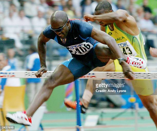 Allen Johnson of USA in action in the men's 110m Hurdles heats at the 9th IAAF World Athletics Championship August 28, 2003 in Paris.