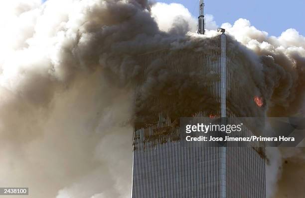 The north tower of the World Trade Center burns after s hijacked airplane hit it September 11, 2001 in New York City. Almost two years after the...
