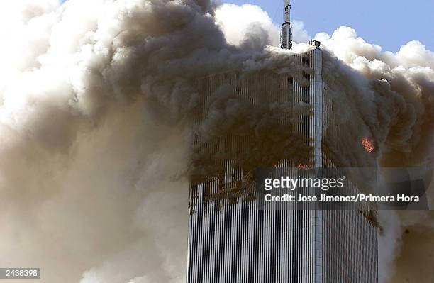 The north tower of the World Trade Center burns after s hijacked airplane hit it September 11, 2001 in New York City. Almost two years after the...